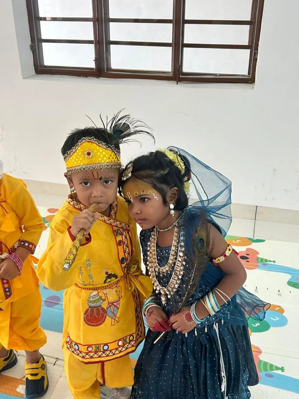 Students performing a dance for Janmashtami