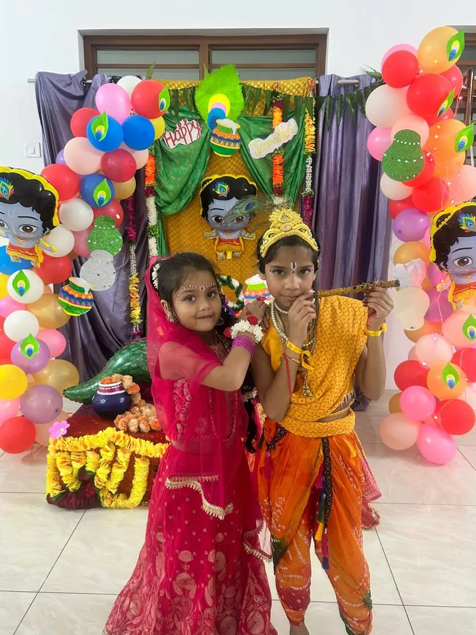 Students on stage together for Janmashtami